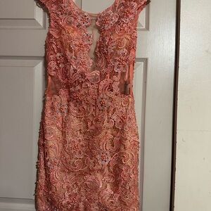 Formal or special occasion dress. Beaded and studded crochet fabric lace.